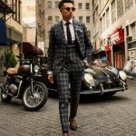 Traje con chaleco gris oscuro cuadro