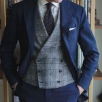 Traje azul liso chaleco gris cuadro
